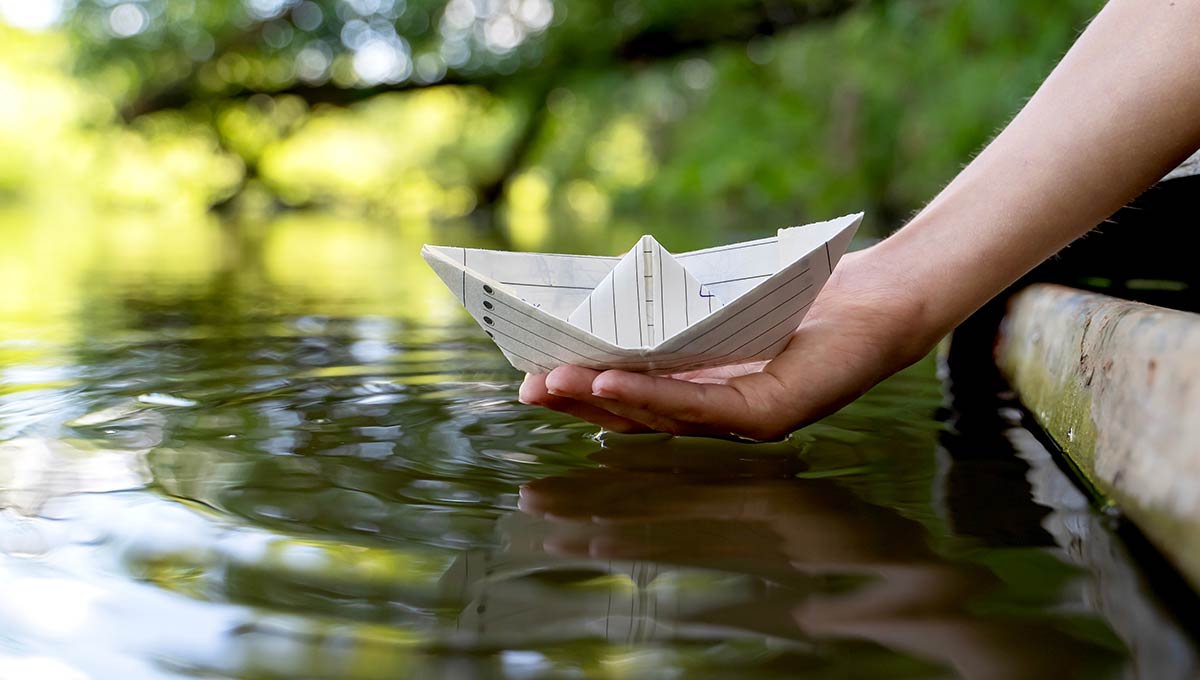 paper boat on river